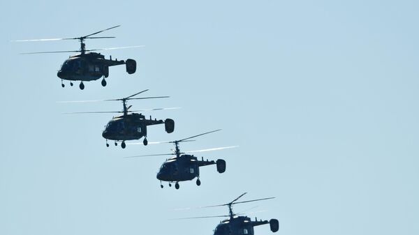 Ka-226 multipurpose helicopters fly during an air parade at the Forsazh 2017 aviation festival marking the 105th anniversary of the Russian Air Force. - Sputnik International