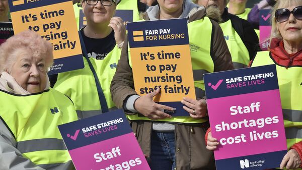 Protesters from the Royal College of Nursing demonstrate outside the Conservative Party conference at the ICC in Birmingham - Sputnik International