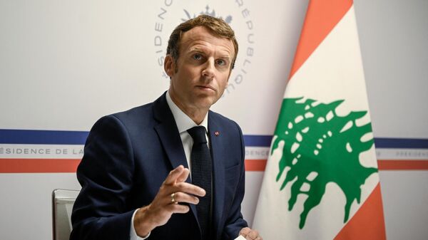 France's President Emmanuel Macron gestures as he attends the Lebanon donors' conference, gathering online representatives of international institutions and heads of state, one year after Beirut port blast, at the Fort de Bregancon, in Bormes-Les-Mimosas, southern France, on August 4, 2021. - Sputnik International