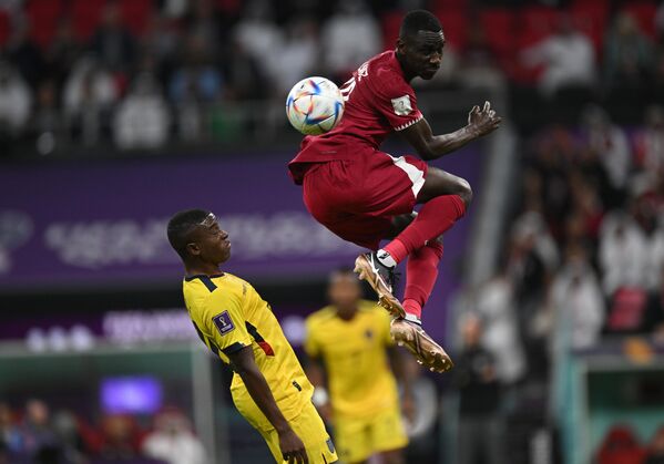 From left to right: Enner Valencia (Ecuador) and Almoez Ali (Qatar) during the World Cup group stage match between Ecuador and Qatar. - Sputnik International