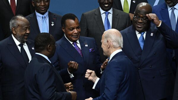 US President Joe Biden participates in a family photo with the leaders of the US-Africa Leaders Summit at the Walter E. Washington Convention Center in Washington, DC, on December 15, 2022. - Sputnik International