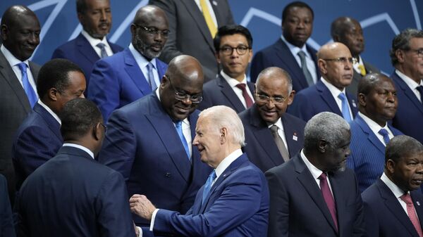 President Joe Biden talks with African leaders before they pose for a family photo during the U.S.-Africa Leaders Summit - Sputnik International