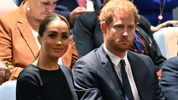 Prince Harry (R) and Meghan Markle (L), the Duke and Duchess of Sussex, attend the 2020 UN Nelson Mandela Prize award ceremony at the United Nations in New York on July 18, 2022 - Sputnik International