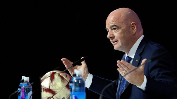 FIFA President Gianni Infantino gives a press conference Qatar National Convention Center (QNCC) in Doha on December 16, 2022, during the Qatar 2022 World Cup football tournament. - Sputnik International