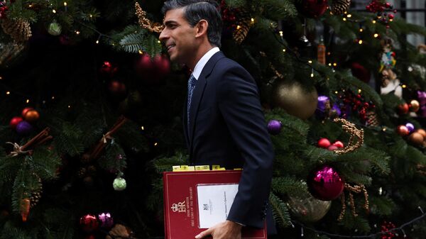 Britain's Prime Minister Rishi Sunak leaves 10 Downing Street, in London, on December 14, 2022 in order to attend the Prime Minister's Questions (PMQ) session at the House of Commons - Sputnik International