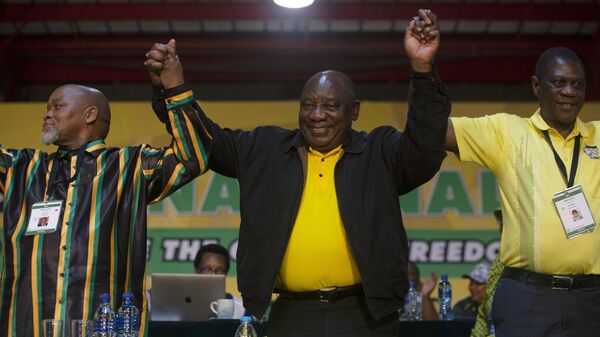 African National Congress (ANC) President Cyril Ramaphosa gestures after being re-elected as the organisations on 4th day of the 55th National Conference in Johannesburg Monday, Dec. 19, 2022.  - Sputnik International