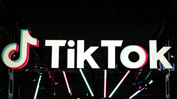 The TikTok logo is pictured at the company's booth during the Tokyo Game Show in Chiba prefecture on September 15, 2022. - Sputnik International