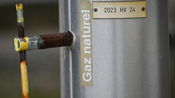 A picture taken on November 28, 2022, shows a sticker reading natural gas on a gas pipe at a GRTgaz compressor station, in Morelmaison, eastern France - Sputnik International