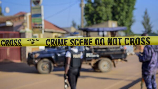 Police secure a road leading to the scene of an explosion in the Komamboga suburb of the capital Kampala, Uganda Sunday, Oct. 24, 2021. - Sputnik International