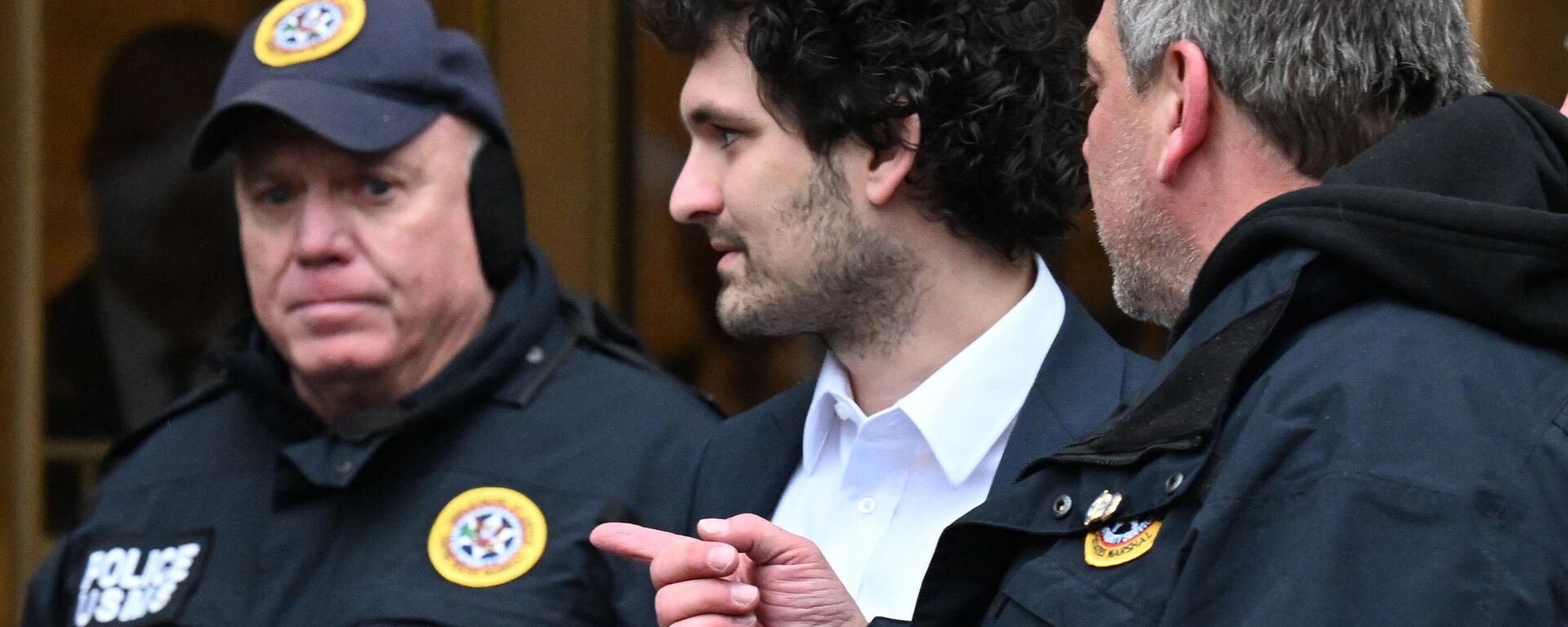 FTX founder Sam Bankman-Fried leaves court following his arraignment in New York City on December 22, 2022.  - Sputnik International, 1920, 23.12.2022