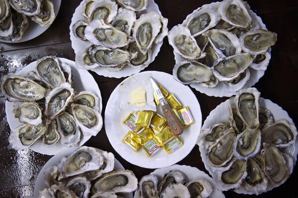 In France, oysters are one of the most popular dishes on a Christmas table. - Sputnik International