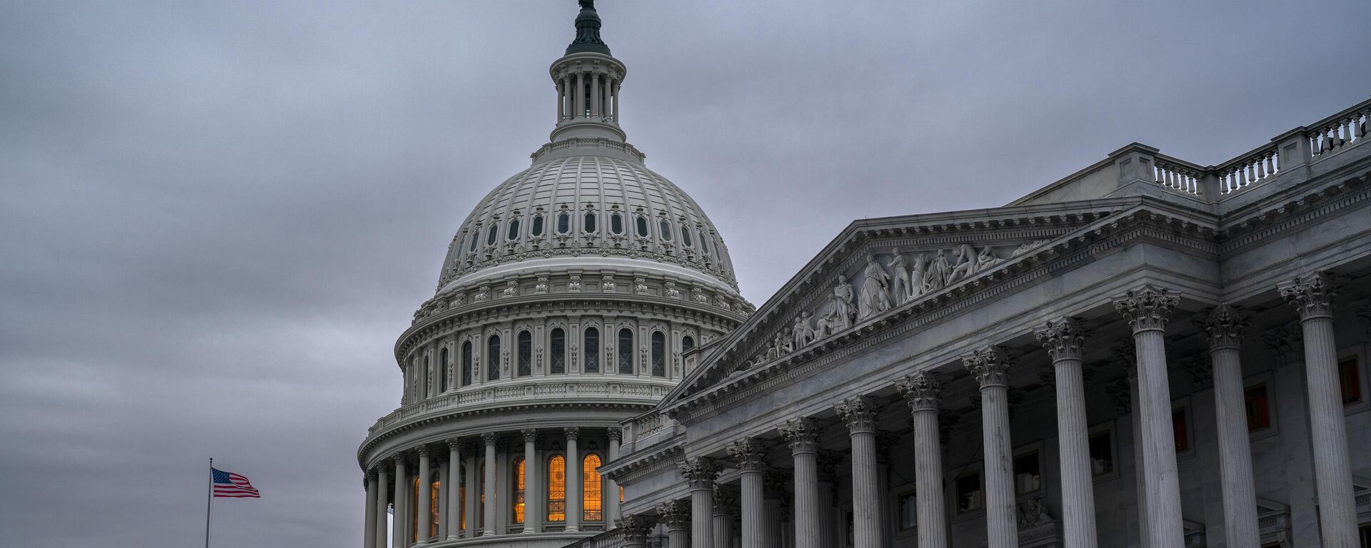 The Senate side of the Capitol is seen in Washington, early Thursday, Dec. 22, 2022, as lawmakers rush to complete passage of a bill to fund the government before a midnight Friday deadline, at the Capitol in Washington, Thursday, Dec. 22, 2022. - Sputnik International, 1920, 09.03.2023