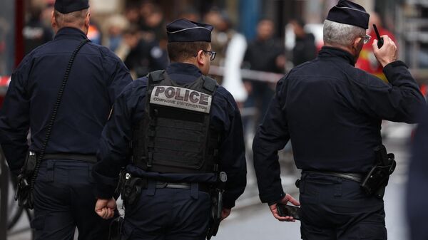 French police secure the street after several shots were fired along rue d'Enghien in the 10th arrondissement, in Paris on December 23, 2022. (Photo by Thomas SAMSON / AFP) - Sputnik International