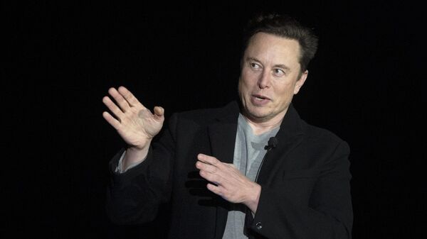 Elon Musk gestures as he speaks during a press conference at SpaceX's Starbase facility near Boca Chica Village in South Texas, on February 10, 2022. - Sputnik International
