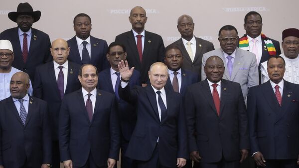 Russian President Vladimir Putin, center, poses for a photo with leaders of African countries at the Russia-Africa summit in the Black Sea resort of Sochi, Russia, on Oct. 24, 2019.  - Sputnik International