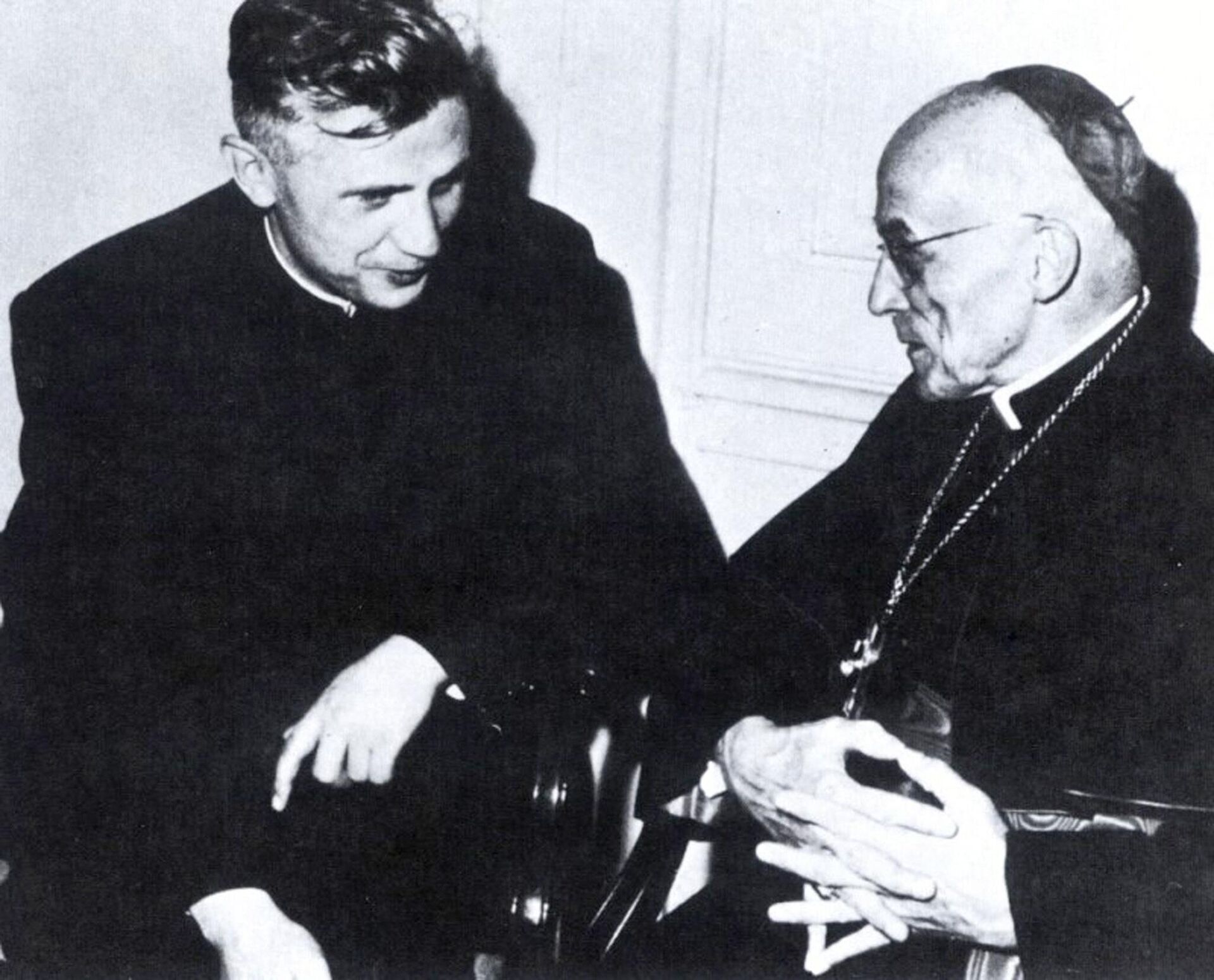 This file photo taken on January 1962 shows Josef Ratzinger (L), then professor of theology with Cologne's Cardinal Joseph Frings who took him as an advisor to the council at the Vatican. Germany's Cardinal Joseph Ratzinger was elected the 265th pope of the Roman Catholic Church on 19 April 2005 and took the name Benedict XVI. - Sputnik International, 1920, 31.12.2022