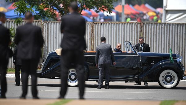 Security agents prepare the presidential Rolls Royce to be used by President-elect Luiz Inacio Lula da Silva at his inauguration ceremony in Brasilia on January 1, 2023.  - Sputnik International
