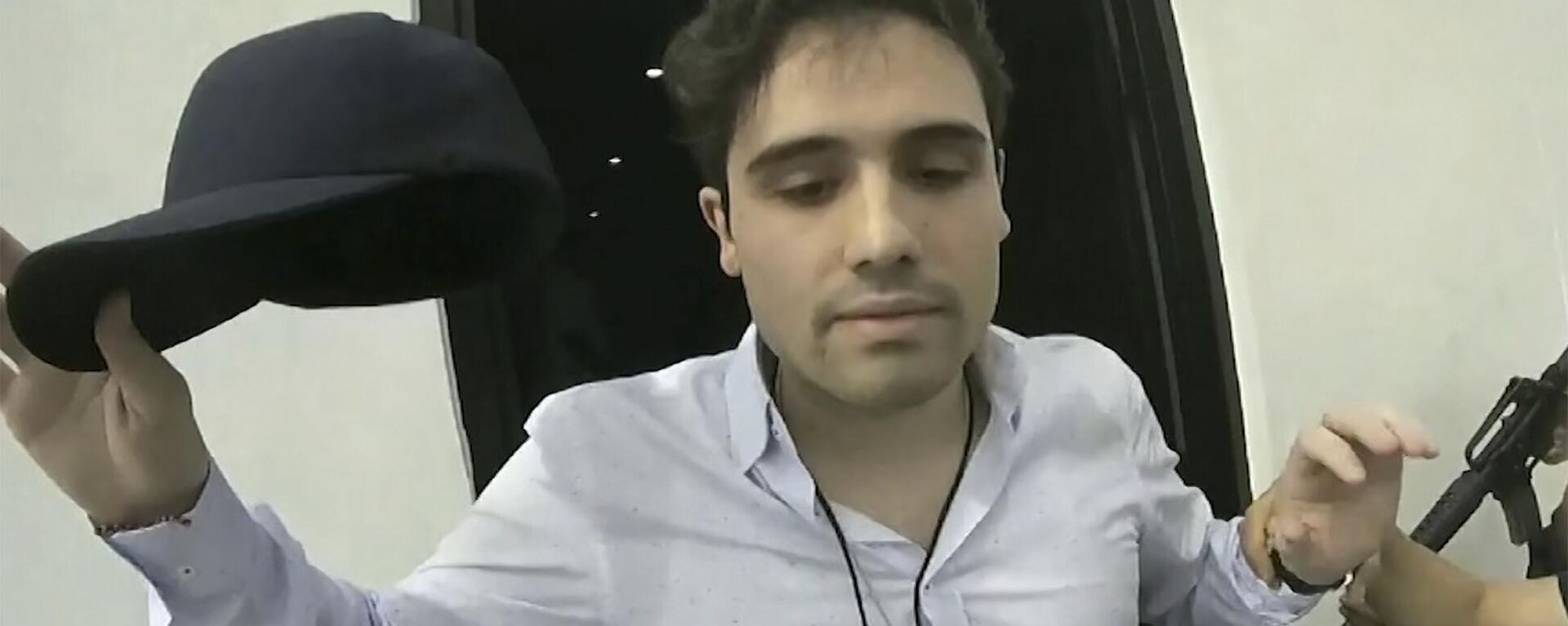 FILE - On October 17, 2019, a video fragment provided by the Mexican government shows Ovidio Guzmán López at the time of his arrest, in Culiacan, Mexico. Mexican security forces were forced to release the son of Sinaloa cartel leader Joaquin El Chapo Guzman that day after a shootout in the western city of Culiacan. - Sputnik International, 1920, 07.01.2023