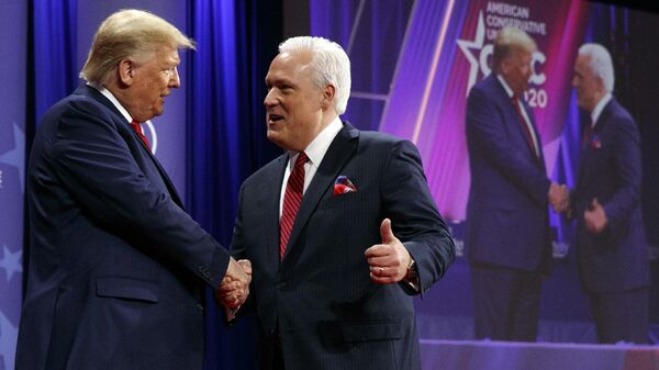 President Donald Trump is greeted by Matt Schlapp, Chairman of the American Conservative Union, as the president arrives to speak at the Conservative Political Action Conference, CPAC 2020, at National Harbor, in Oxon Hill, Md., Saturday Feb. 29, 2020. (AP Photo/Jacquelyn Martin) - Sputnik International