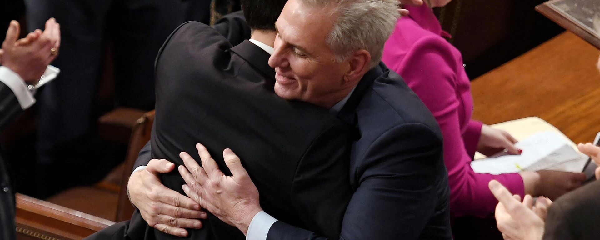 Newly elected Speaker of the US House of Representatives  Kevin McCarthy hugs his Floor Director John Leganski after being annointed on the 15th round of voting at the US Capitol in Washington, DC, on January 7, 2023. - Sputnik International, 1920, 07.01.2023