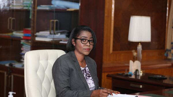 Gabon Prime Minister Rose Christiane Ossouka Raponda poses in her office in Libreville during an interview with AFP on March 26, 2021.  - Sputnik International