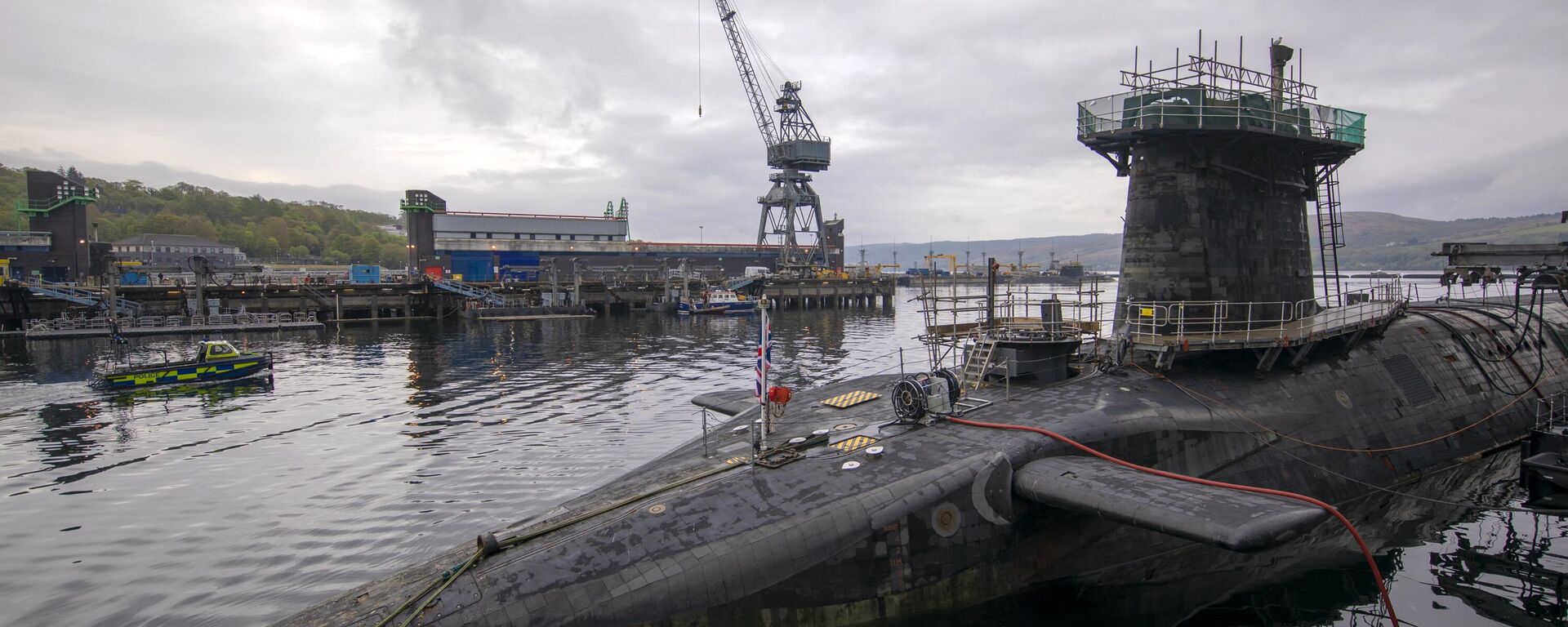 Vanguard-class submarine HMS Vigilant, one of the UK's four nuclear warhead-carrying submarines at HM Naval Base Clyde, Faslane, west of Glasgow, Scotland on April 29, 2019 - Sputnik International, 1920, 31.01.2023