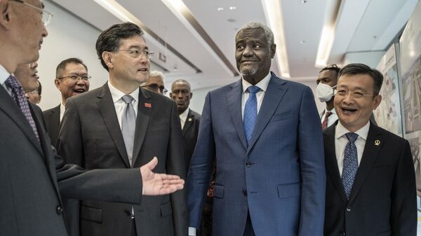 China's Foreign Minister Qin Gang (2nd L) and Moussa Faki (2nd R), Chairperson of the African Union (AU) Commission, tour the building of African CDC (Centers for Disease Control) headquarters during the inauguration ceremony in Addis Ababa, Ethiopia, on January 11, 2023. - Sputnik International
