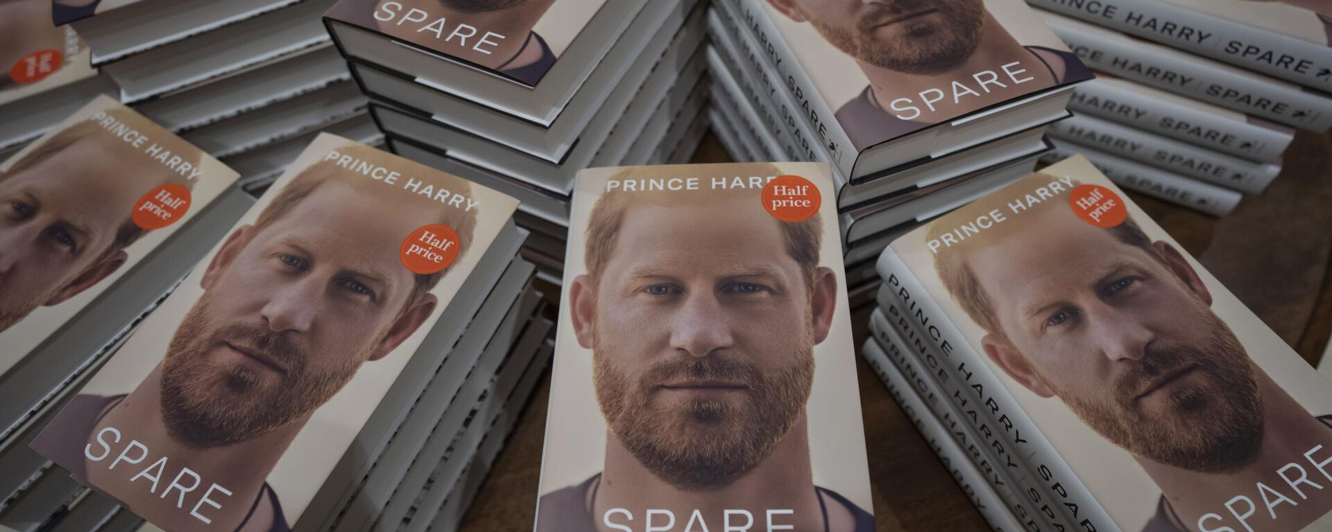 FILE - Copies of the new book by Prince Harry called Spare are displayed at a book store in London, Jan. 10, 2023. Prince Harry’s explosive memoir, with its damning allegations of a toxic relationship between the monarchy and the press, is likely to accelerate the pace of change already under way within the House of Windsor following the death of Queen Elizabeth II. - Sputnik International, 1920, 12.01.2023