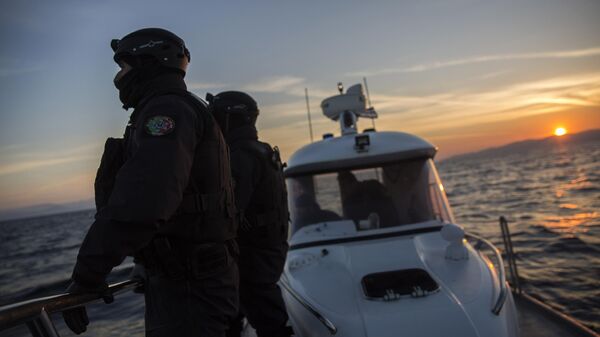 Members of the Frontex, European Border Protection Agency, from Portugal patrol near the northeastern Greek island of Lesbos, on Dec. 8, 2015. - Sputnik International