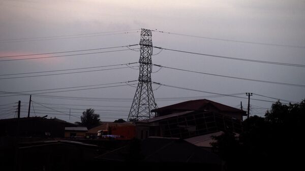 A general view of houses built across high tension cables against warnings by the authorities at Asese, Ogun State in southwest Nigeria, on September 8, 2020.  - Sputnik International