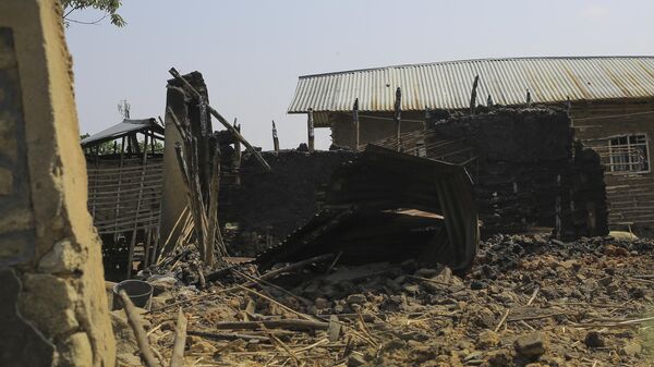 A general view of a burnt house in Rwangoma, Beni, Democratic Republic of Congo, on July 1, 2021, after ten people were killed in an attack overnight by suspected members of the Allied Democratic Forces (ADF) Islamist militia.  - Sputnik International