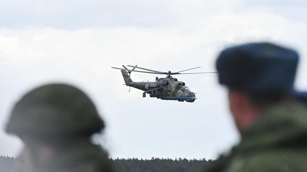 Mi-24 military helicopter takes part in the joint military drills between Belarus and Russia at the training ground in Belarus. - Sputnik International
