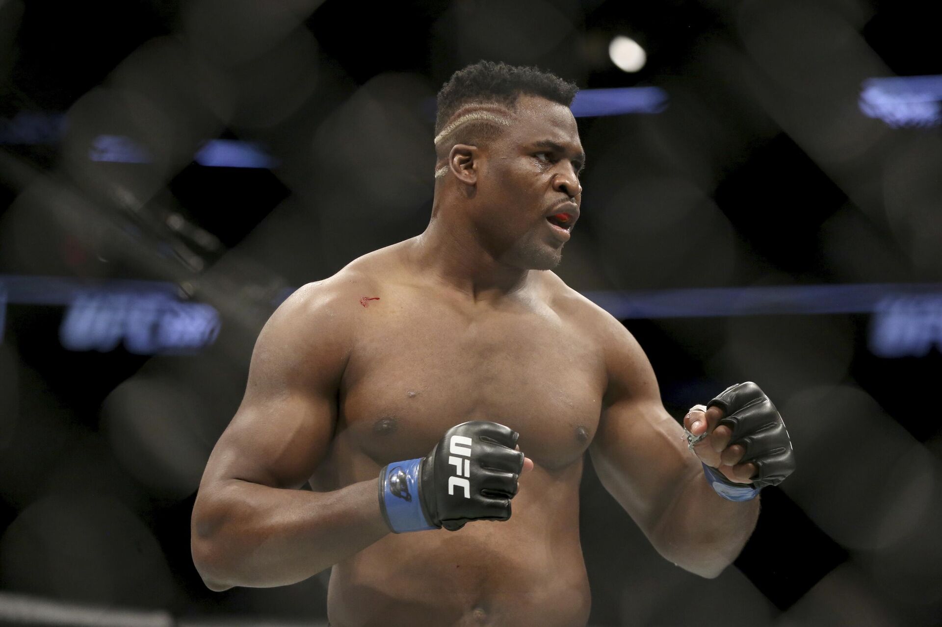 Francis Ngannou is shown  during a heavyweight championship mixed martial arts bout against Stipe Miocic at UFC 220, Sunday, Jan. 21, 2018, in Boston. - Sputnik International, 1920, 17.01.2023