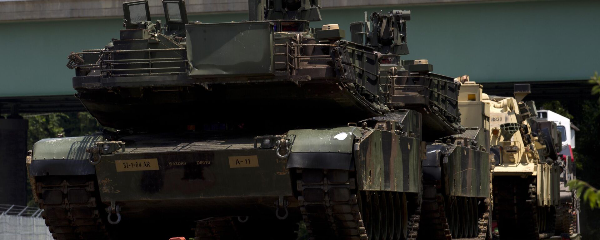Abrams tanks are seen on a flat car in a rail yard, Tuesday, July 2, 2019, in Washington. - Sputnik International, 1920, 27.09.2023