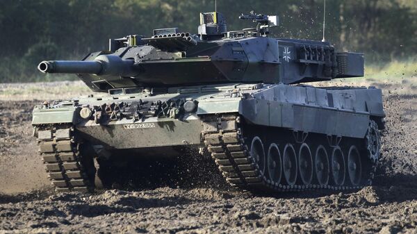 A Leopard 2 tank is pictured during a demonstration event held for the media by the German Bundeswehr in Munster near Hannover, Germany, Wednesday, Sept. 28, 2011. - Sputnik International