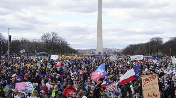 People participate in the March for Life rally in front of the Washington Monument, Friday, Jan. 20, 2023, in Washington. - Sputnik International