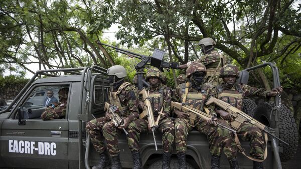 Members of the Kenya Defence Forces (KDF) deployed as part of the East African Community Regional Force (EACRF) ride in a vehicle in Goma, in eastern Congo Wednesday, Nov. 16, 2022 - Sputnik International