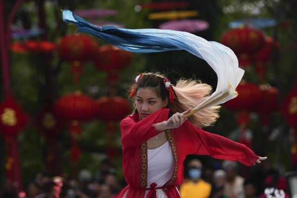 A dancer performs during the Lunar New Year celebration in Panama City, on Sunday 22 January 2023. Chinese communities worldwide are celebrating as they welcome the Year of the Rabbit in the Chinese zodiac. - Sputnik International