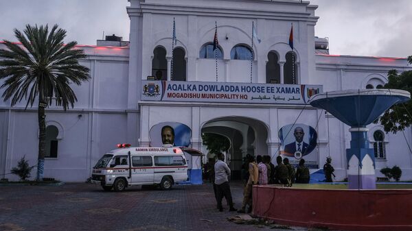 An ambulance is parked at the entrance to the Mogadishu Municipality Headquaters in Mogadishu on January 22, 2023, after at east six people were killed on January 23, 2023 in an attack by Al-Shabaab militants at the mayor's office in central Mogadishu, according to police sources. - Sputnik International