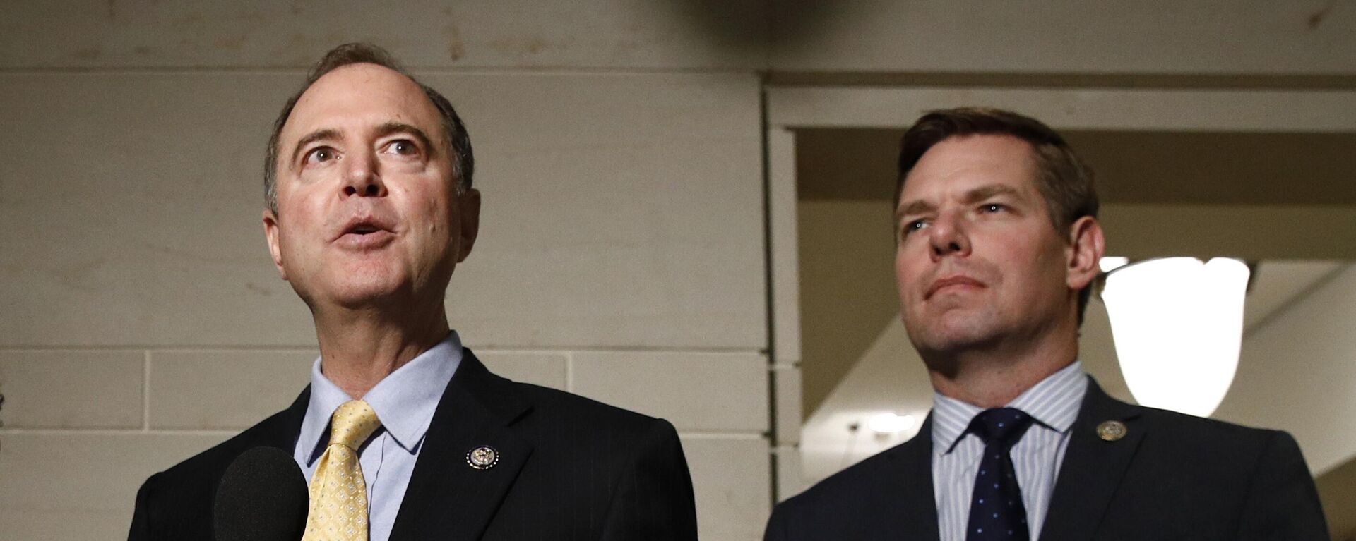 FILE - In this May 28, 2019 file photo, Rep. Adam Schiff, D-Calif., left, and Rep. Eric Swalwell, D-Calif., speak with members of the media on Capitol Hill in Washington. The Justice Department under former President Donald Trump secretly seized data from the accounts of at least two Democratic lawmakers in 2018 as part of an aggressive crackdown on leaks related to the Russia investigation and other national security matters, according to three people familiar with the seizures. - Sputnik International, 1920, 25.01.2023
