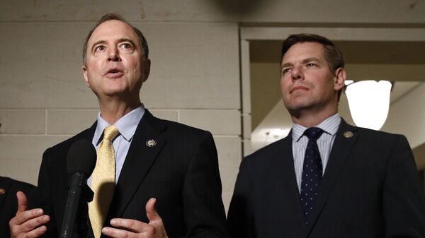 FILE - In this May 28, 2019 file photo, Rep. Adam Schiff, D-Calif., left, and Rep. Eric Swalwell, D-Calif., speak with members of the media on Capitol Hill in Washington. The Justice Department under former President Donald Trump secretly seized data from the accounts of at least two Democratic lawmakers in 2018 as part of an aggressive crackdown on leaks related to the Russia investigation and other national security matters, according to three people familiar with the seizures. - Sputnik International