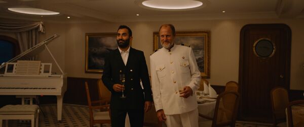 &quot;Triangle of Sadness&quot; is an anti-capitalist parody by Swedish filmmaker Ruben Ostlund. The story tells about a yacht of extremely rich passengers with a captain, who believes in Marxism (and alcohol). - Sputnik International