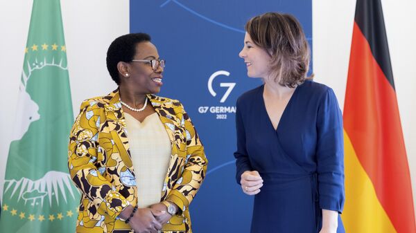 The Deputy Chair of the African Union Commission, Monique Nsanzabaganwa, left, and German Foreign Minister Annalena Baerbock, right, talk during a meeting as part of  the G7 Foreign Ministers Meeting in Muenster, Germany, Friday, Nov. 4, 2022. - Sputnik International