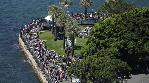 People line the foreshore to watch activities on Sydney Harbour during Australia Day celebration in Sydney, Thursday, Jan. 26, 2023. - Sputnik International