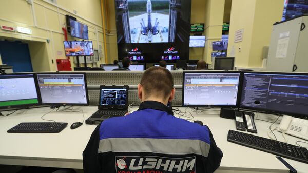 Russia's Center for Operation of Space Ground Based Infrastructure (TsENKI) staff member works in the control centre of the launching complex of Soyuz-2 carrier rockets at the Vostochny cosmodrome, some 180 km north of the Far Eastern city of Blagoveschensk, Amur region, Russia.  - Sputnik International