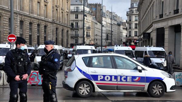 Police officers stand guard during a demonstration in Paris - Sputnik International