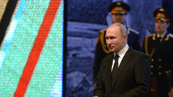 Vladimir Putin at a concert to mark the 75th anniversary of victory int he Battle of Stalingrad. - Sputnik International