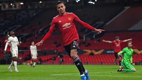 In this file photo taken on April 29, 2021 Manchester United's English striker Mason Greenwood celebrates after scoring their sixth goal during the UEFA Europa League semi-final first leg football match between Manchester United and Roma at Old Trafford stadium in Manchester, northwest England - Sputnik International
