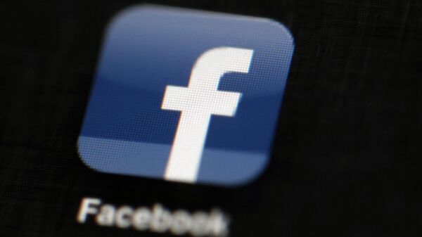 The Facebook logo is displayed on an iPad in Philadelphia, May 16, 2012 - Sputnik International