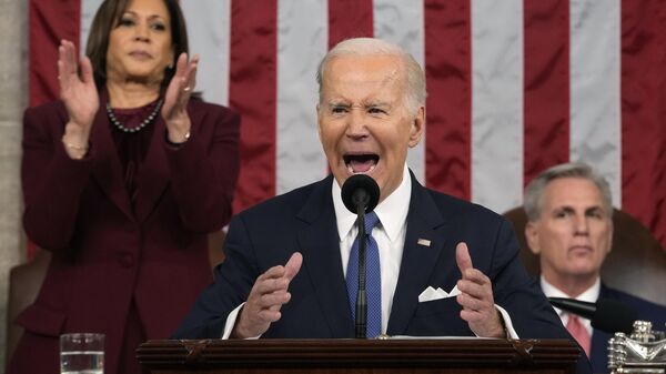President Joe Biden talks about passing an assault weapons band as he delivers the State of the Union address to a joint session of Congress at the U.S. Capitol, Tuesday, Feb. 7, 2023, in Washington. - Sputnik International